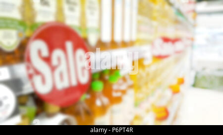 Abstract blur of aisle in supermarket with customers and department store interior for background Stock Photo