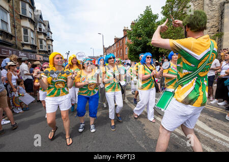Oxford, UK. 1st July 2018. The annual Cowley Road Carnival was estimated to have drawn in 50,000 revellers to East Oxford. The hot and sunny day reached 28 degrees. This years parade theme was based upon Ôicons of artÕ. The carnival was organised by charity Cowley Road Works. Credit: Stephen Bell/Alamy Live News.