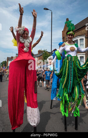 Oxford, UK. 1st July 2018. The annual Cowley Road Carnival was estimated to have drawn in 50,000 revellers to East Oxford. The hot and sunny day reached 28 degrees. This years parade theme was based upon Ôicons of artÕ. The carnival was organised by charity Cowley Road Works. Credit: Stephen Bell/Alamy Live News.