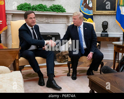 Washington, USA. 2nd July 2018. United States President Donald J. Trump meets with the Prime Minster of The Netherlands, Mark Rutte, at The White House in Washington, DC, July 2, 2018. Credit: Chris Kleponis/Pool via CNP | usage worldwide Credit: dpa picture alliance/Alamy Live News Stock Photo