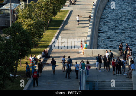 FIFA World Cup, Moscow, Monday, July 02, 2018. Hot and sunny day in Moscow. Football fans, international tourists and Muscovites entertain themselves near the Kremlin. International football funs tour Moscow, learn Moscow landmarks, and make acquaintances with each other and Russian people. Informal fan area on the Moscow-river embankment. Credit: Alex's Pictures/Alamy Live News Stock Photo