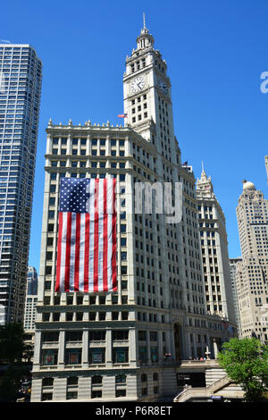 Chicago, Illinois / USA - July 2, 2018: An eight-story American flag decorates the side of Chicago's Wrigley Building for the 4th of July celebrations. Credit: D Guest Smith/Alamy Live News Stock Photo