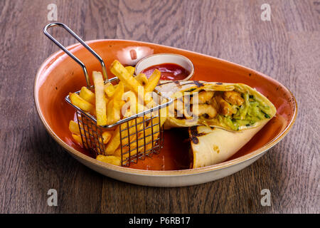 Pork Burrito with French potato Stock Photo