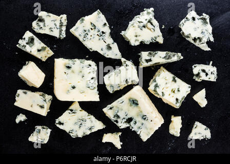 Danish blue cheese on dark background. Top view Stock Photo