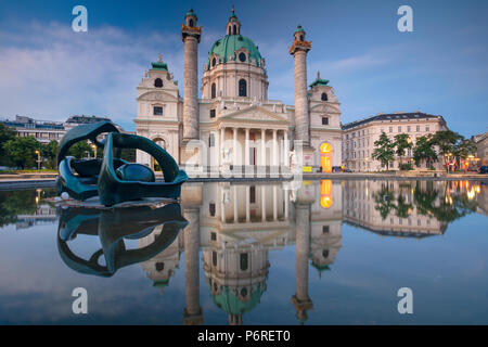 Vienna. Image of St. Charles's Church in Vienna, Austria during twilight blue hour. Stock Photo