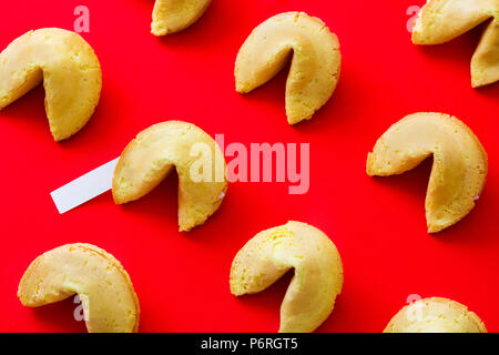 Fortune cookies pattern on red background Stock Photo