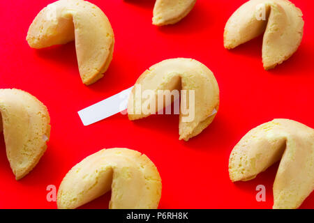 Fortune cookies pattern on red background Stock Photo