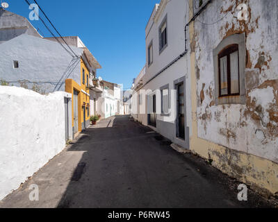 Summer mood of the alley in the old town of Estoi, Algarve, Portugal Stock Photo