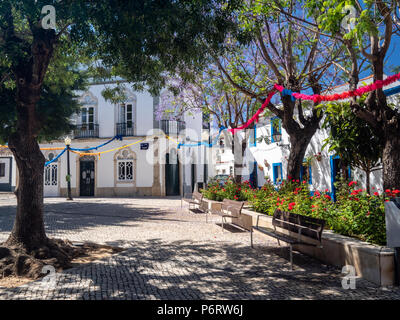 Summer mood of the alley in the old town of Estoi, Algarve, Portugal Stock Photo