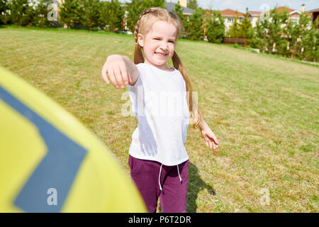 Girl Playing Frisbee Stock Photo