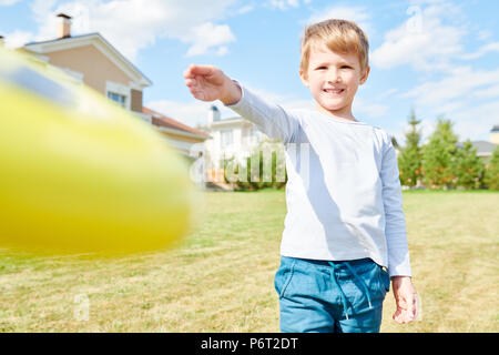 Boy  Playing Frisbee Stock Photo