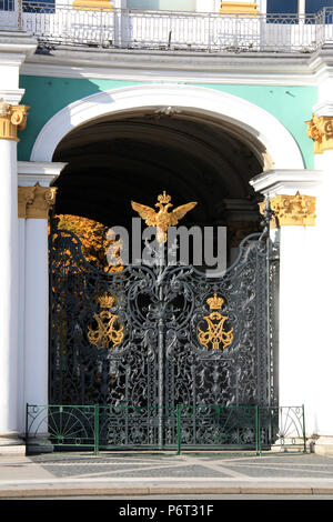 Double-headed eagle guarding the patterned wrought-iron gate of the Hermitage in St. Petersburg, Russia Stock Photo