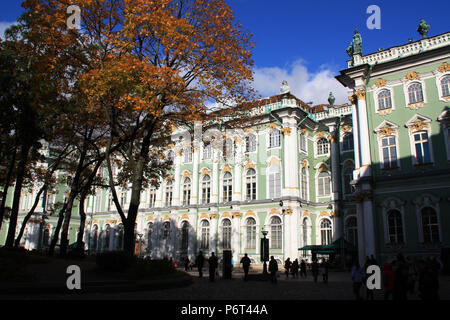 Indian summer coloring the foliage of the trees inside the courtyard of the Hermitage in St. Petersburg, Russia, into beautiful red, orange and yellow Stock Photo