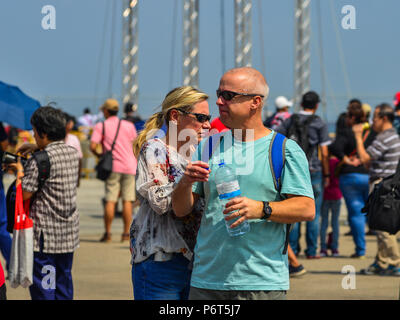 Singapore - Feb 10, 2018. People enjoying at the city park near Air Base in Changi, Singapore. Stock Photo