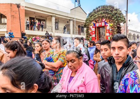 Parramos, Guatemala - December 28, 2016: Locals participate in religious procession near UNESCO World Heritage Site of Antigua Stock Photo