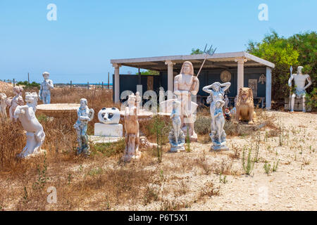 A number of Greek styled garden statues standing in a disused garden and landscape centre,near Ayia Napa, Cyprus Stock Photo