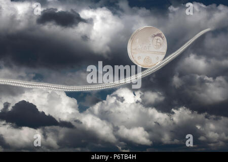 Bitcoin balancing on rope in dramatic sky Stock Photo