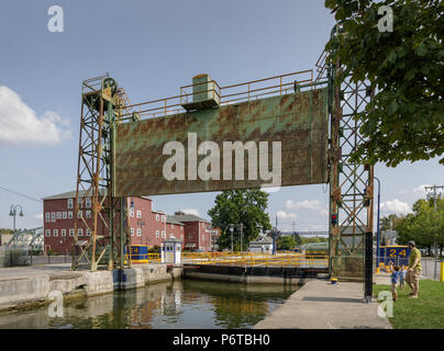 Baldwinsville, New York: Father and young sons enjoy the Erie Canal lock. Stock Photo