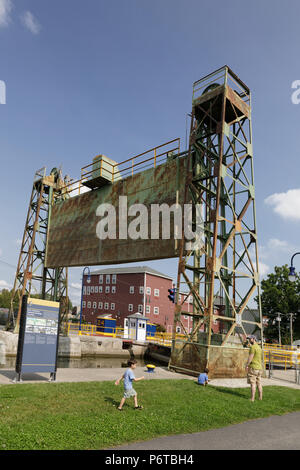 Baldwinsville, New York: Father and young sons enjoy the Erie Canal lock. Stock Photo