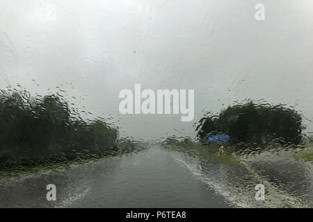 Berlin, Germany, poor visibility during heavy rain on a country road Stock Photo