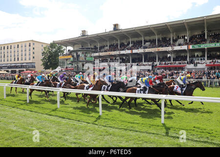 Hamburg, horses and jockeys in the 148th IDEE German Derby in front of