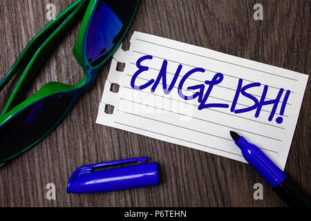 Word writing text English Motivational Call. Business concept for Relating to England its People or their Language Ideas notebook page blue letters op Stock Photo