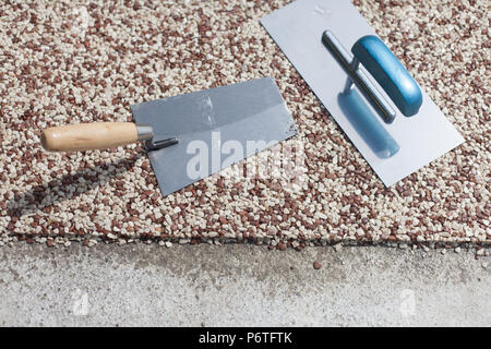 Coloured Concrete Around Pool with tools Stock Photo