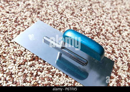 Coloured Concrete Around Pool with tools Stock Photo
