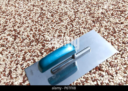 Coloured Concrete Around Pool with tools Stock Photo