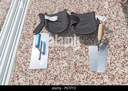 Coloured Concrete Around Pool with tools Stock Photo