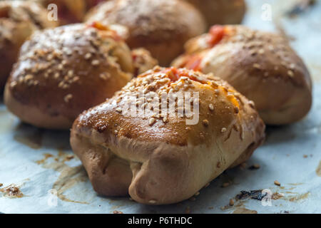 Roll stuffed with tomatoes Stock Photo