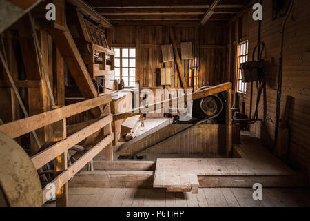 Interior of old wooden watermill in Finland Stock Photo