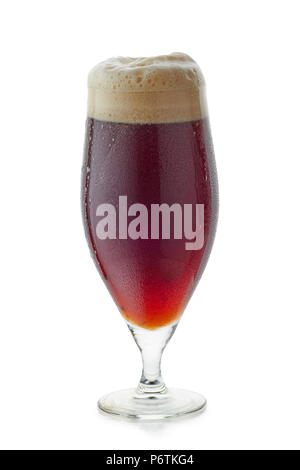 Glass of dark beer with foam on white Stock Photo