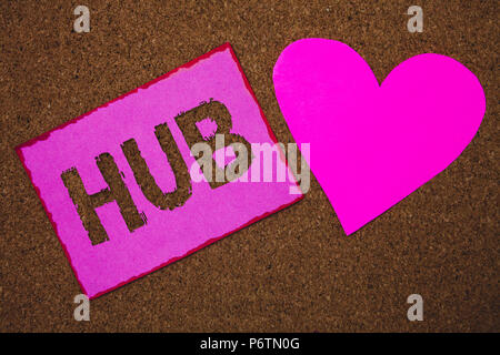 Handwriting text Hub. Concept meaning Device connecting computers Center of Wheel Activities Transportation Paper heart ideas messages cork background Stock Photo