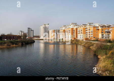 Modern apartment blocks, River Taff in Cardiff, Wales UK Waterfront Living Riverside development Stock Photo