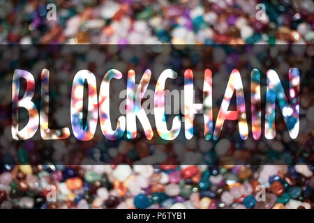 Text sign showing Blockchain. Conceptual photo Register Log Financial Statement Digital Data Technology Record Blurry candies candy ideas message refl Stock Photo