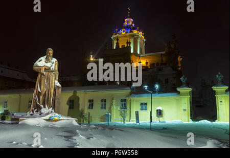 LVIV, UKRAINE - NOVEMBER 13, 2016:  St. George Cathedral  and Andrey Sheptytsky monument. Beautiful night winter cityscape in the center of Lviv city. Stock Photo