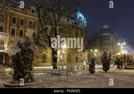 LVIV, UKRAINE - FEBRUARY 04, 2018: Beautiful night winter cityscape in the center of Lviv city. Some lens flare flrom lamps available. Stock Photo