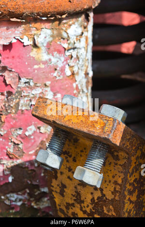 Scrap metal, nuts, bolts and buffers from old trains, on the scrap pile at Minehead station on the West Somerset Railway. Stock Photo