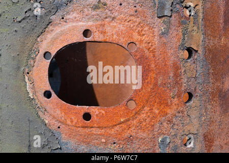 large cylindrical part from locomotive 9351 (possibly part of the old boiler?) by the engine sheds at Minehead Station on the West Somerset Railway. Stock Photo