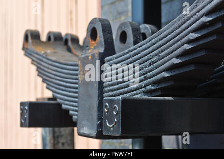 New suspension leaf springs being stored in the engine sheds at Minehead Station on the West Somerset Railway, ready for use on their rolling stock. Stock Photo