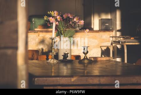 Furniture of a french rural restaurant in the sun Stock Photo