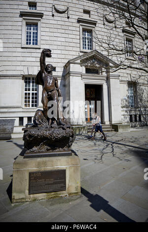 Manchester Central Library Manchester's first modern figurative outdoor Bronze sculpture, John Cassidy fecit 1907. gifted to city council by James Gre Stock Photo