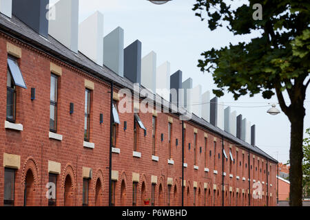 Chimney Pot Park is an urban community of upside down houses in Salford, Manchester. refurbished terraced houses in langworthy by Urbansplash