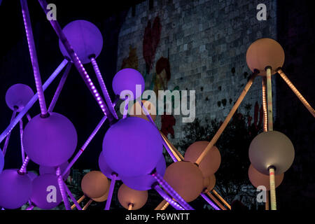 Jerusalem, Israel. 2nd July, 2018. Amigo and Amigo's 'Affinity' light sculpture near the walls of the Old city of Jerusalem during the 2018 Festival of lights. This is the 10th anniversary of the festival, which draws hundreds of thousands of visitors to the old city of Jerusalem. Credit: Yagil Henkin/Alamy Live News Stock Photo