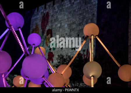 Jerusalem, Israel. 2nd July, 2018. Amigo and Amigo's 'Affinity' light sculpture near the walls of the Old city of Jerusalem during the 2018 Festival of lights. This is the 10th anniversary of the festival, which draws hundreds of thousands of visitors to the old city of Jerusalem. Credit: Yagil Henkin/Alamy Live News Stock Photo