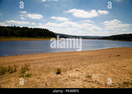 Yorkshire, UK. 3rd July, 2018. 3rd July 2018 As the heatwave continues with no rainfall forecast for the near futre levels in Yorkshire waters reservoirs are begining to noticably fall. This is a view of the Fewston resevoir, Yorkshire Credit: Andrew Gardner/Alamy Live News Stock Photo