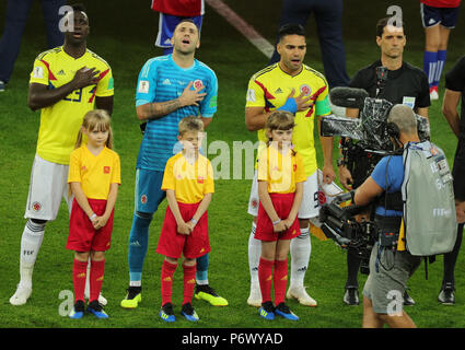 Moscow, Russia. 03rd July, 2018. Soccer: World Cup, Eighth finals, Colombia vs England in the Spartak Stadium. Colombia's Davinson Sanchez (left to right), goalkeeper David Ospina, and Radamel Falcao singing the national anthem ahead of the game. Credit: Christian Charisius/dpa/Alamy Live News Stock Photo
