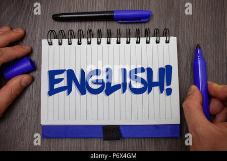 Word writing text English Motivational Call. Business concept for Relating to England its People or their Language Man hold holding blue marker notebo Stock Photo