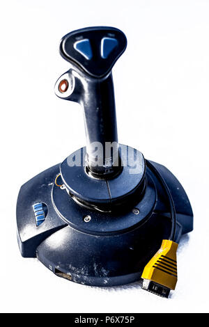 Vintage Joy stick used for playing pc/video game isolated on white.  Concept of gaming. Stock Photo